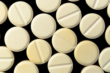 Image showing Medical pills on black background