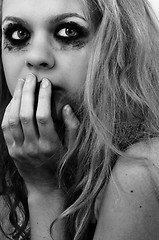Image showing Scared girl with beautiful blond hair