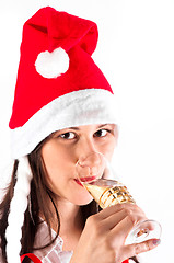 Image showing Girl drinking champagne in Christmas custome
