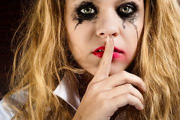 Image showing Silence, showed by a sad girl