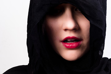 Image showing Woman with black hood against white isolated background