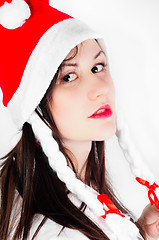 Image showing Girl in Santa's hat against white background