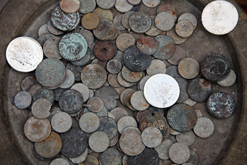 Image showing Collection of old coins from different countries, El-Jem market, Tunisia