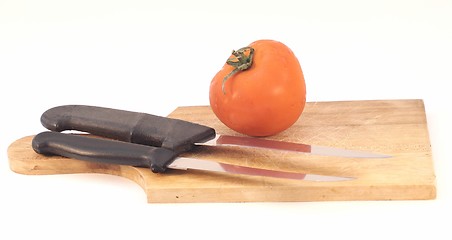 Image showing Cutting a tomato