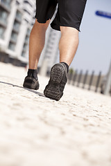 Image showing Athlete man shoes walking