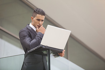 Image showing Modern businessman at the office balcony