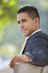 Image showing Businessman sit in the bench park