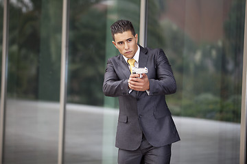 Image showing Security Businessman with a handgun