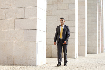 Image showing Confident businessman walking