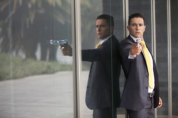 Image showing Security Businessman with a handgun