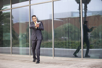 Image showing Security Businessman with a handgun