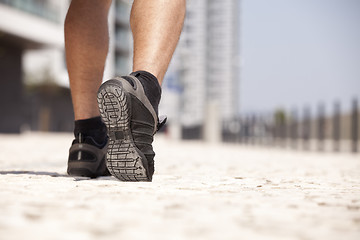 Image showing Athlete man shoes walking