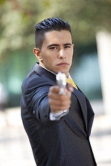 Image showing Security Businessman with a handgun