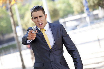 Image showing Security Businessman with a handgun