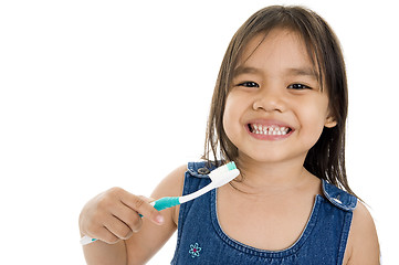 Image showing little asian girl with toothbrush