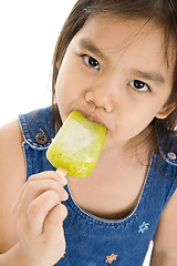 Image showing little girl eating ice cream