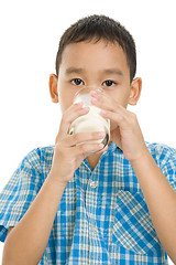 Image showing asian boy drinking milk