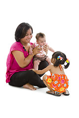 Image showing happy mother with two sweet girls