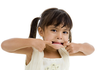 Image showing cute little kid making a grimace