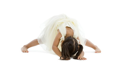 Image showing little girl trying to do the splits