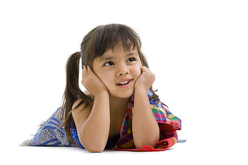 Image showing cute little girl laying on the floor