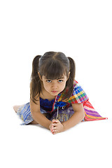 Image showing cute kid with hand folded, isolated on white background