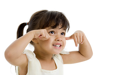 Image showing cute happy girl looking up