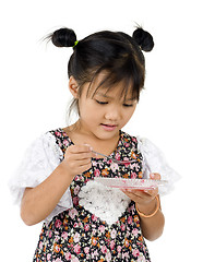 Image showing little girl eating