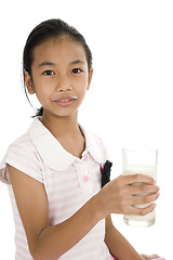 Image showing teeny with a glass of milk