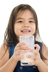 Image showing girl with a glass of milk