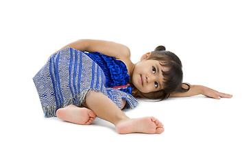 Image showing cute little girl laying on the floor