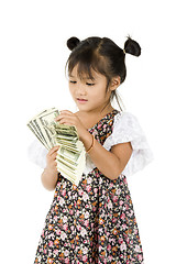 Image showing little girl counting money