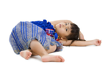 Image showing cute little girl laying on the floor