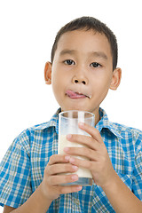 Image showing boy enjoying milk