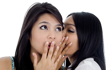 Image showing woman telling her friend a secret