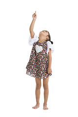 Image showing little girl pointing and looking up