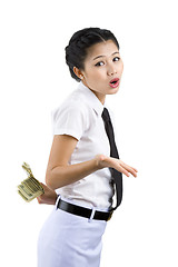 Image showing woman hiding money