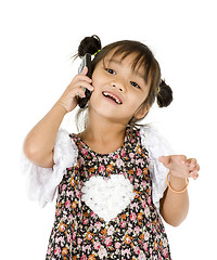 Image showing happy little girl on the phone