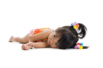 Image showing cute little girl laying down
