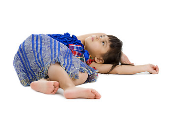 Image showing cute little girl laying on the floor