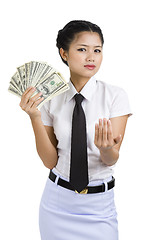 Image showing businesswoman with a lot of money