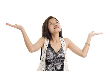 Image showing woman checking for rain