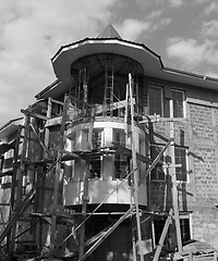 Image showing scaffolding near cottage