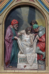 Image showing 14th Stations of the Cross, Jesus is laid in the tomb and covered in incense