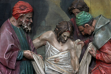 Image showing 14th Stations of the Cross, Jesus is laid in the tomb and covered in incense