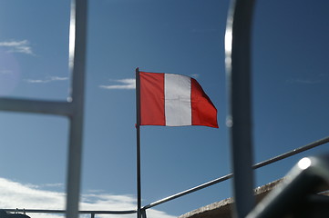Image showing Peru flag on Titicaca lake