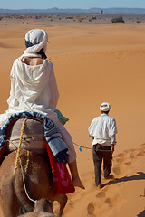 Image showing caravan of tourists in desert