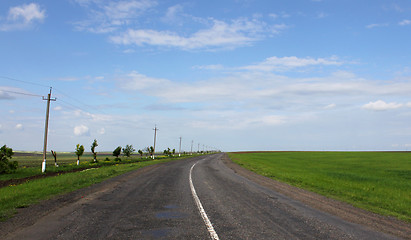 Image showing road amomg fields