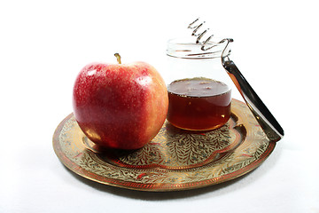 Image showing Honey jar with apple