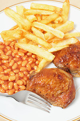 Image showing lemon chicken fries and beans meal